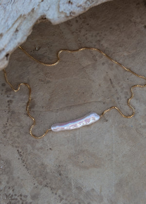 Close up of white pearl Azura necklace