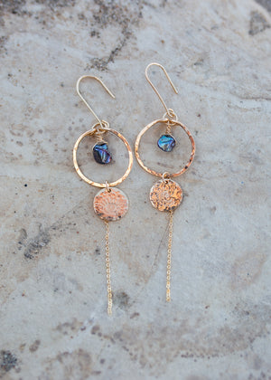 Hammered gold dangley earrings with peacock blue pearls and evil eye and celestial moon stamps