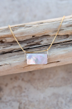 Close up view of the mother of pearl pendant