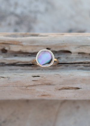 Round gold bezel ring with abalone face