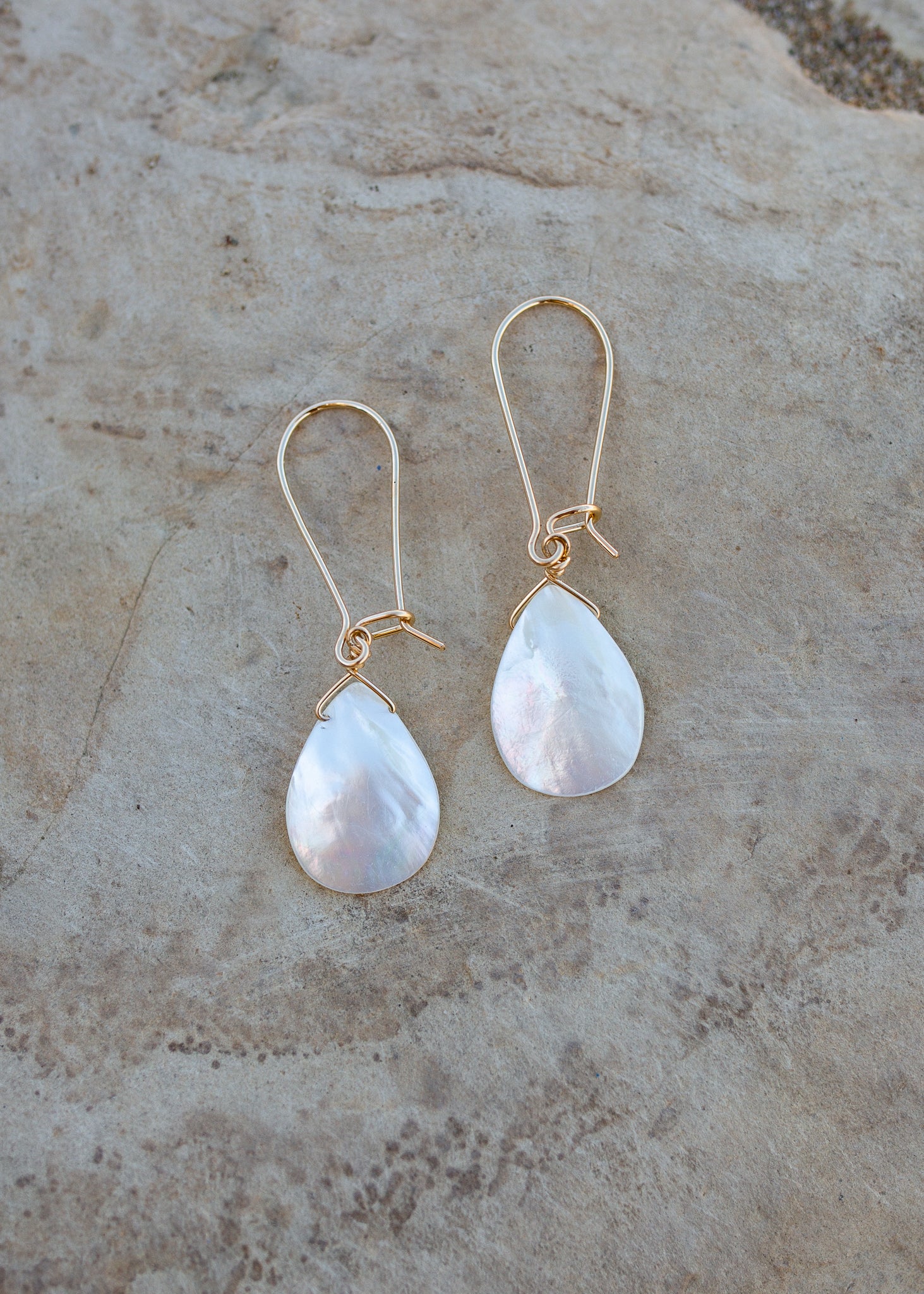 Mother of pearl droplet shaped shells on french ear wires